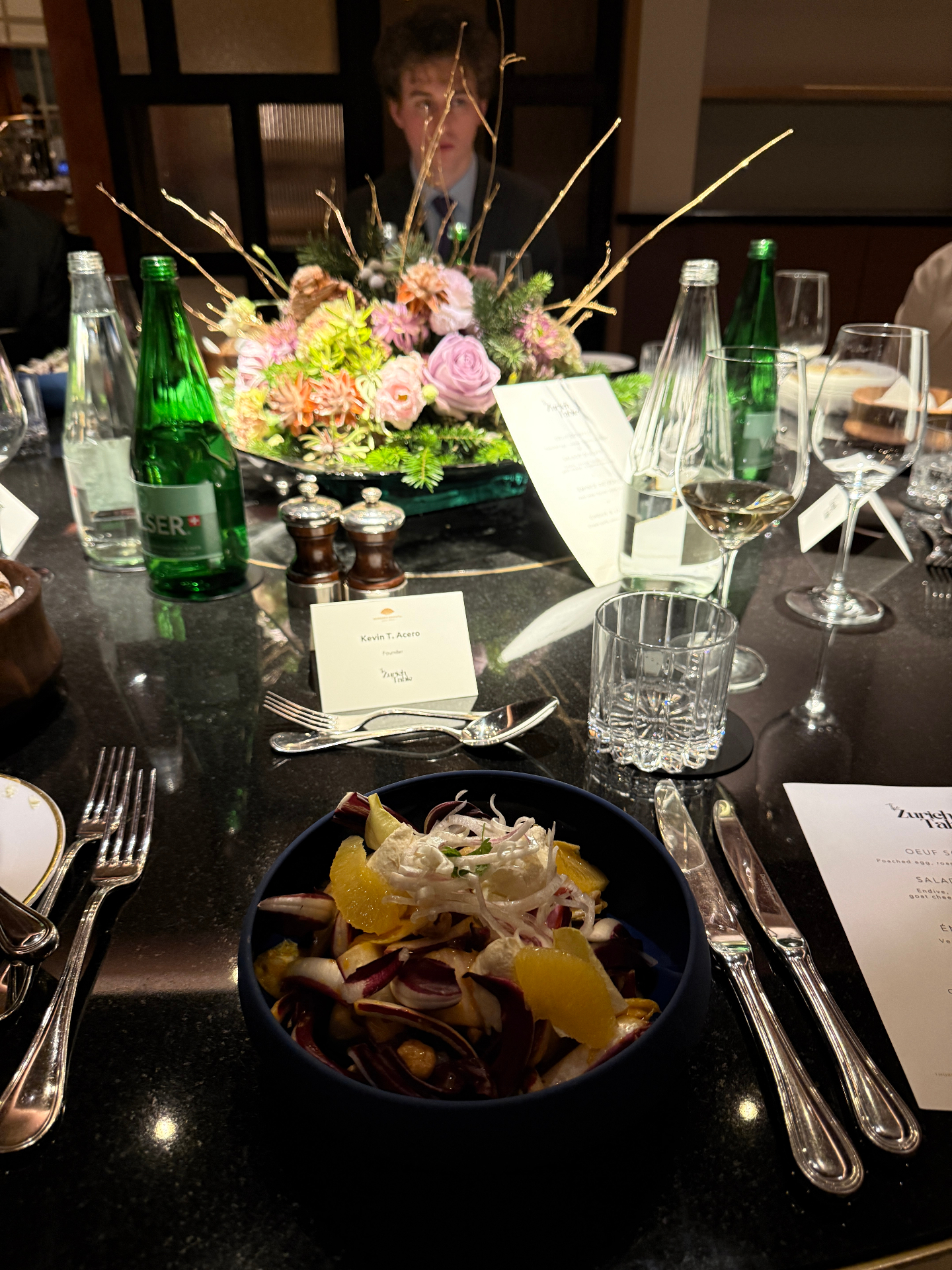 Floral centerpiece on the founding dinner table