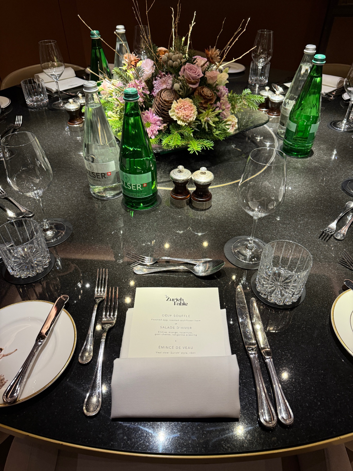 Place setting with The Zurich Table menu card